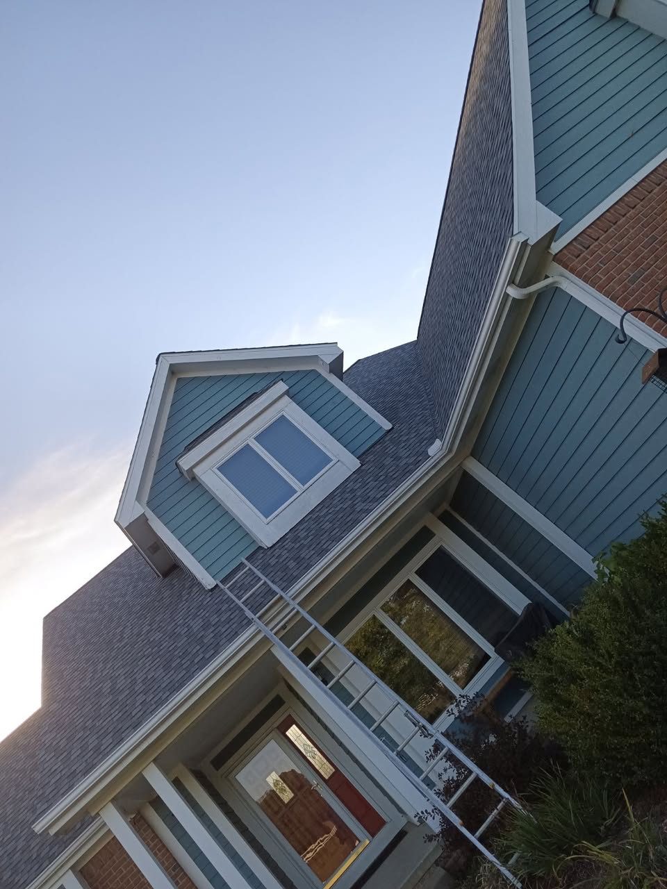 Completed siding and roofing project on Michigan home